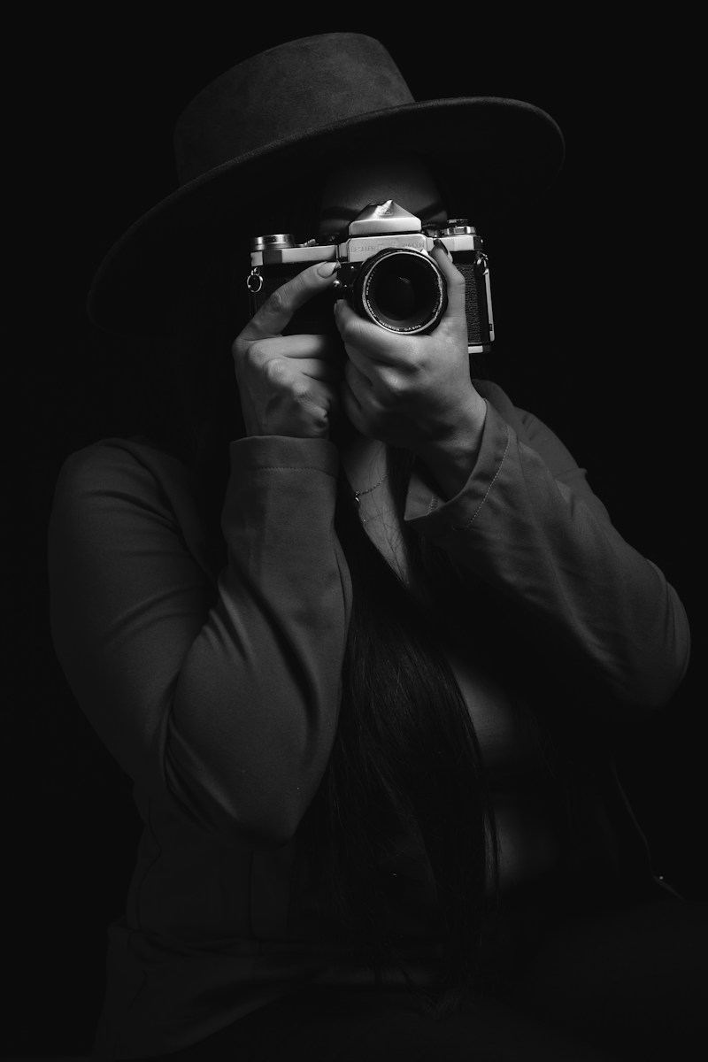 Photographer holding a camera, stand-in